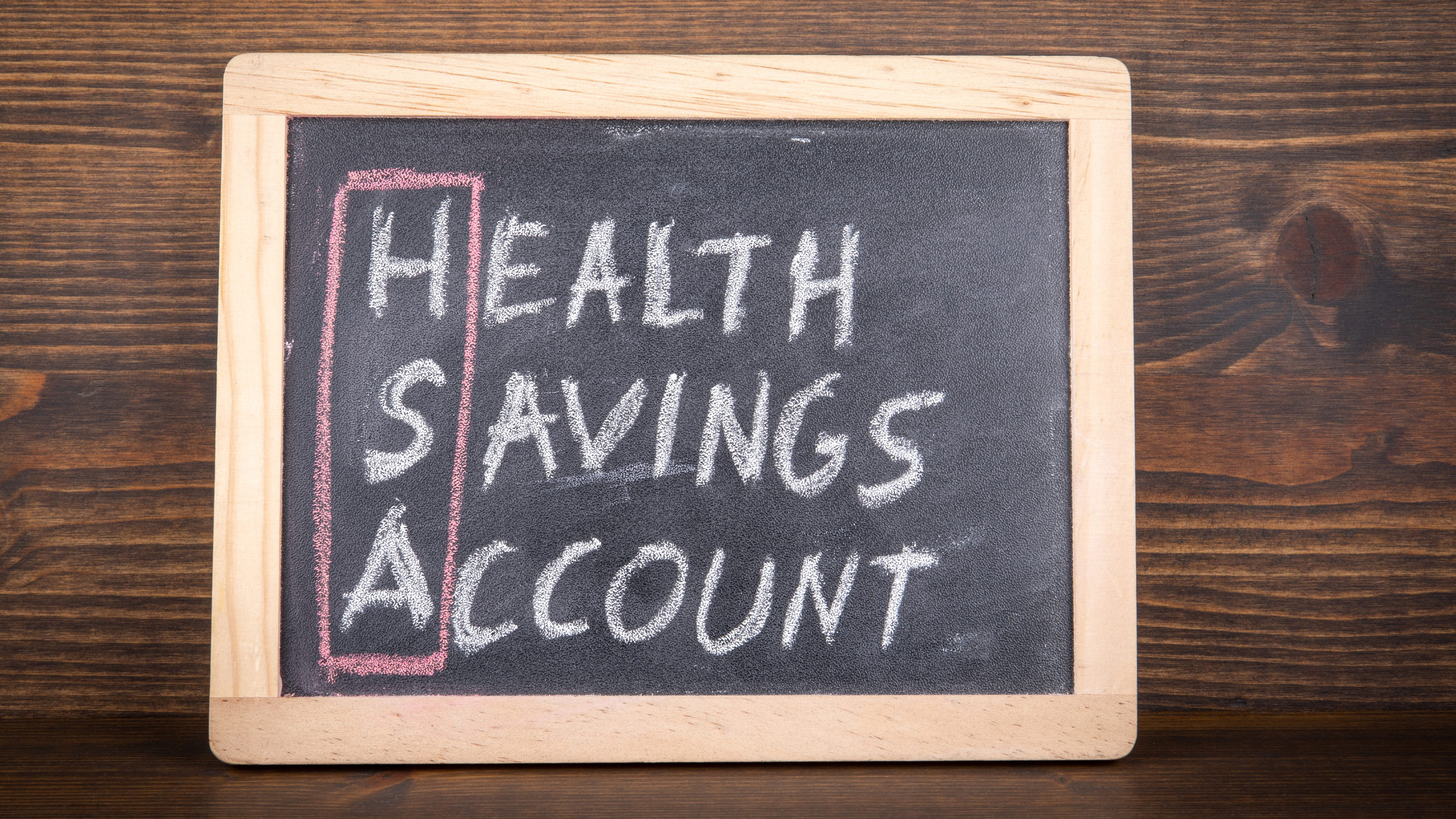health savings account written on chalkboard